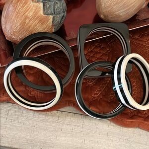 Goddess-size bracelets, black & white, asymmetrical size.